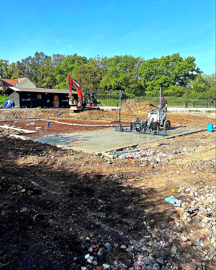 JDG Groundworks — Laser-guided power float screed in progress