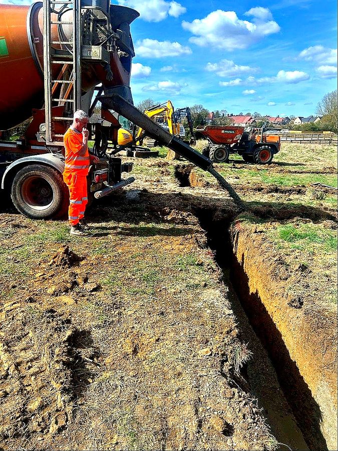 JDG Groundworks — Same-day shutter-and-pour — direct from mixer into foundation trench