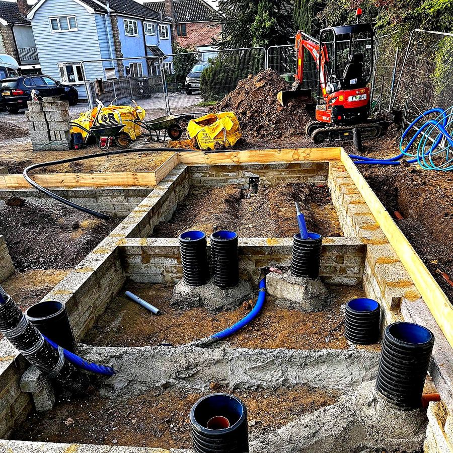 JDG Groundworks — Below-slab service ducts and drainage within block-lined shuttering