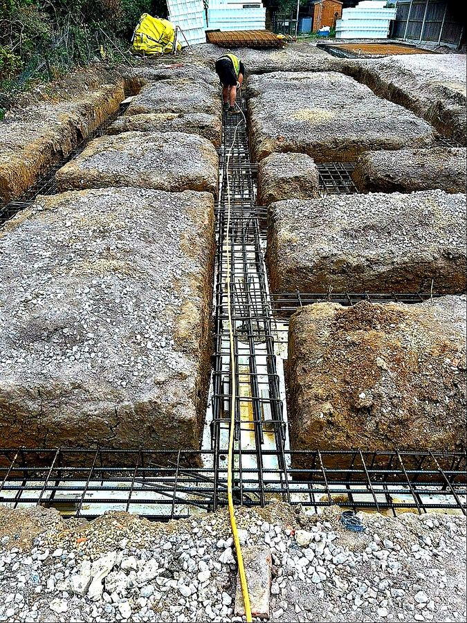 JDG Groundworks — Reinforced concrete beam formation with rebar cage preparation